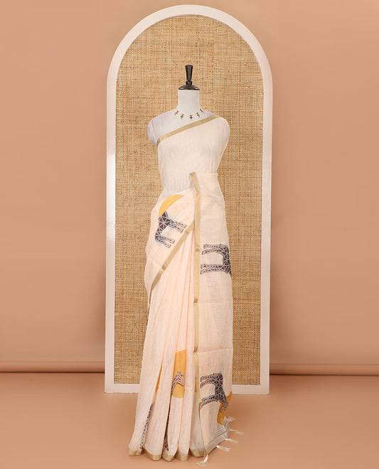 Cream plain & giraffe motifs printed linen cotton saree, zari piping border, giraffe printed pallu & vertical striped blouse