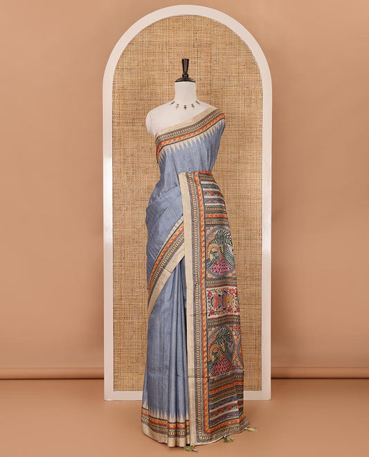 Blue plain semi-tussar saree, contrast temple geometric printed border, kaleidoscope-colored Madhubani-style printed pallu & contrast plain blouse