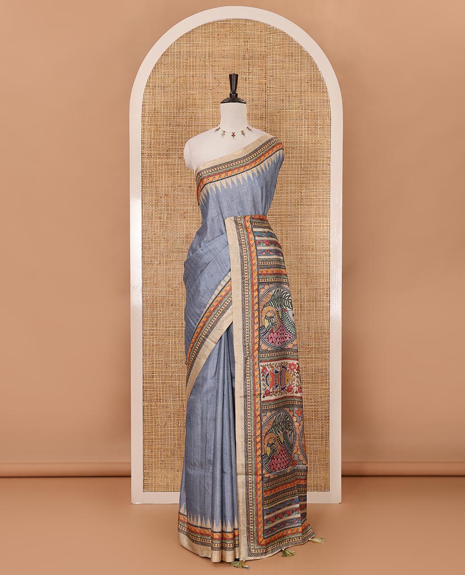 Blue plain semi-tussar saree, contrast temple geometric printed border, kaleidoscope-colored Madhubani-style printed pallu & contrast plain blouse