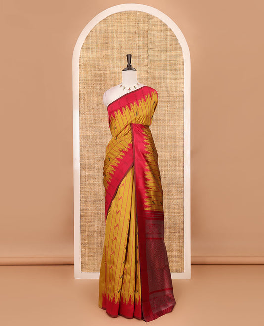 Mustard vertical striped & parrot motifs kanchi silk saree, contrast satin temple border, zari-rich jaal pallu & contrast zari design blouse