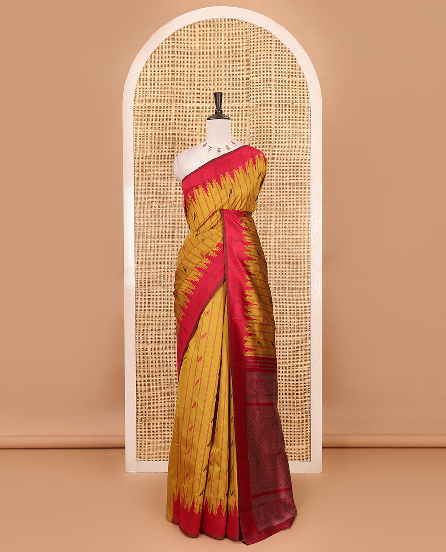 Mustard vertical striped & parrot motifs kanchi silk saree, contrast satin temple border, zari-rich jaal pallu & contrast zari design blouse