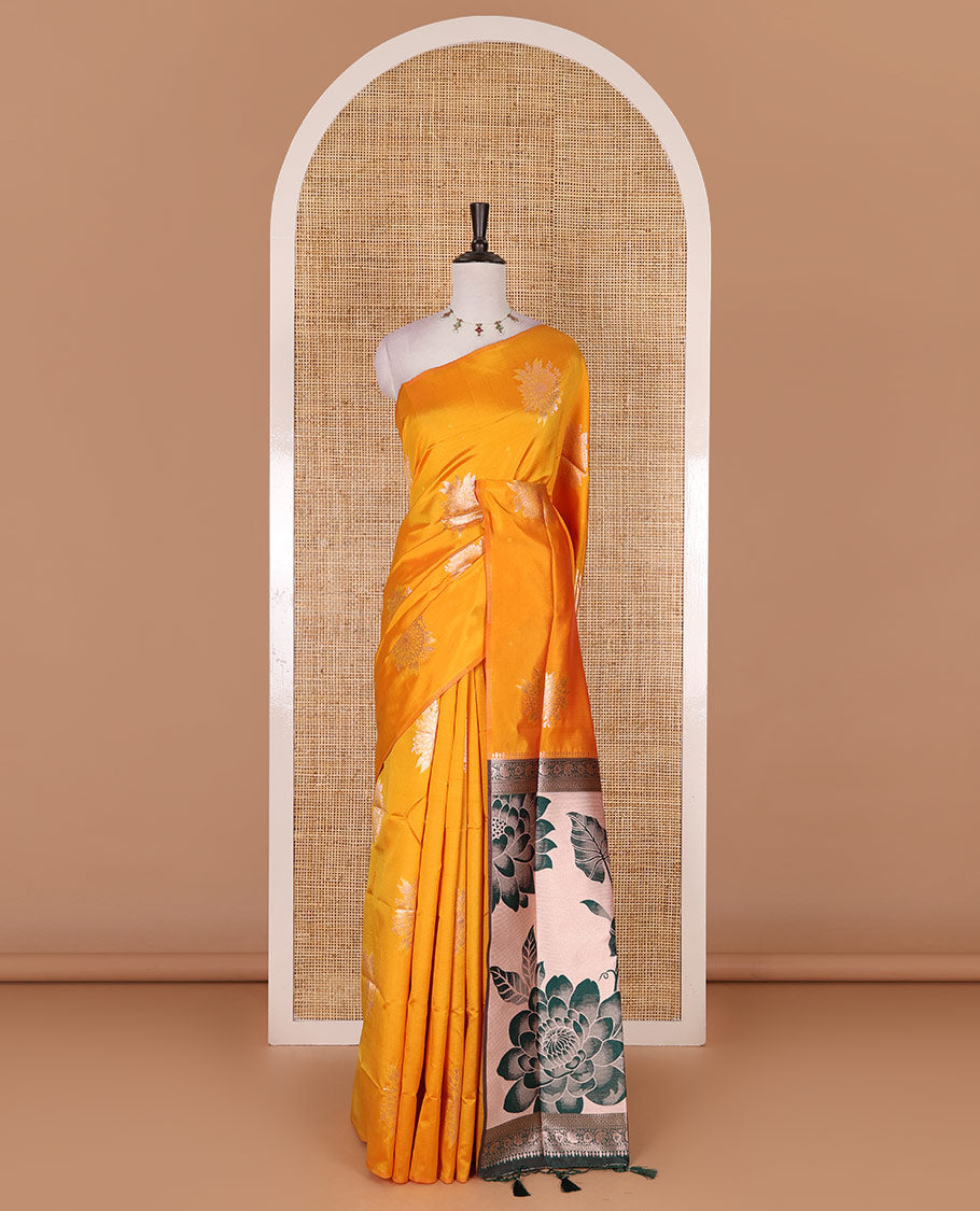 Borderless yellow floral motifs steeped elite soft silk saree, contrast lotus-like motifs pallu, and contrast buttas blouse