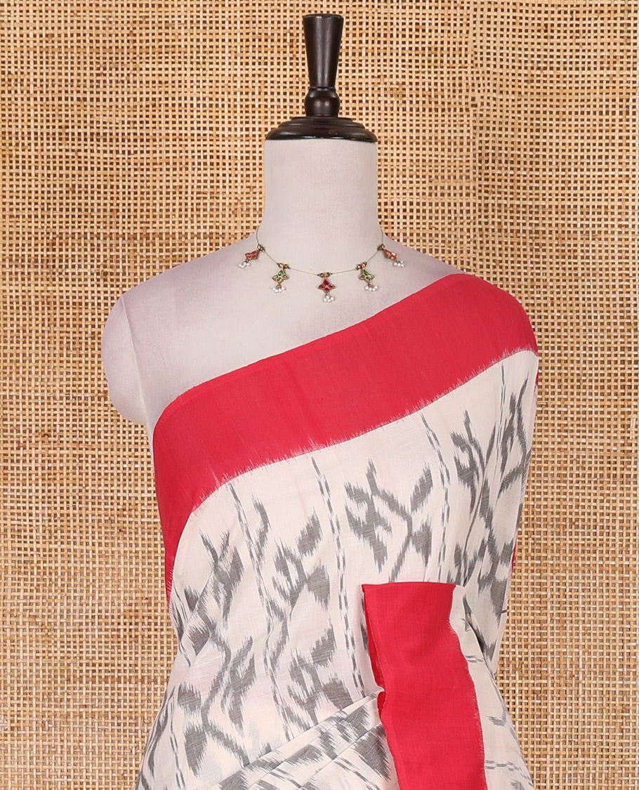 Half white vine design ikkat cotton saree, contrast plain border,  ikkat design pallu, and contrast plain blouse