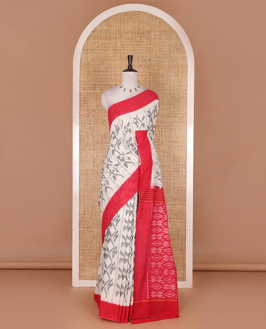 Half white vine design ikkat cotton saree, contrast plain border,  ikkat design pallu, and contrast plain blouse