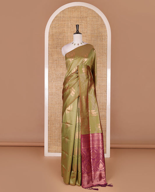Borderless green stripes and zari floral buttas elite soft silk saree, contrast ogee patterned zari pallu, and contrast zari design blouse