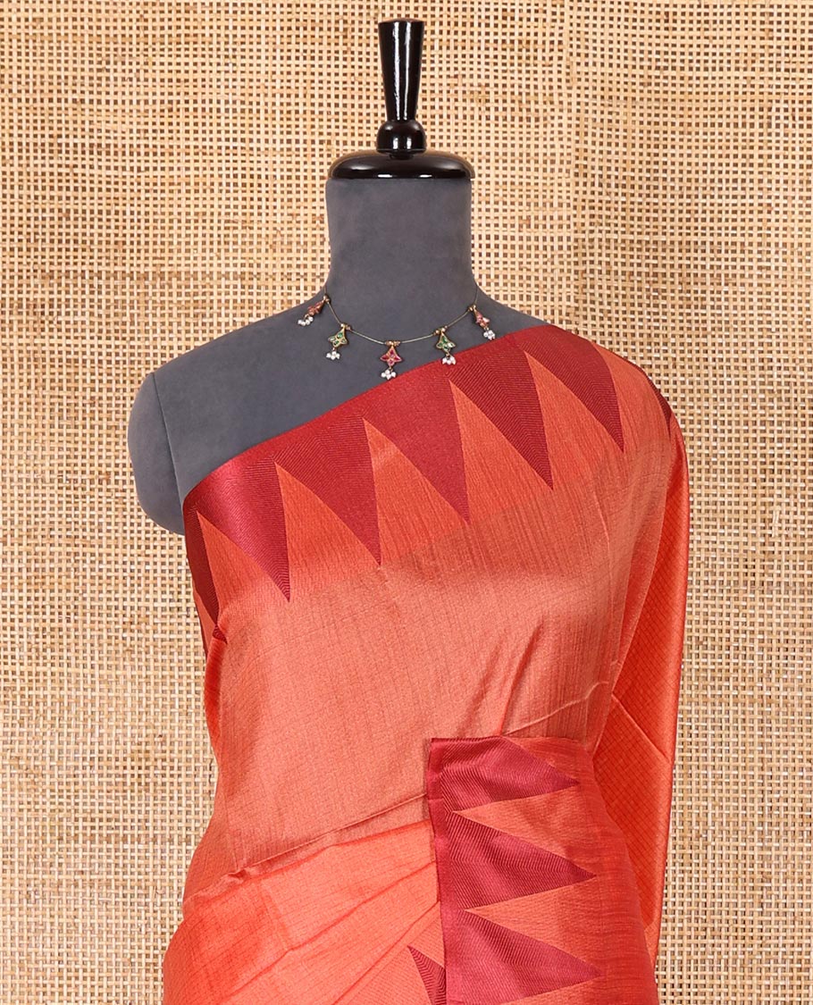 Orange sparsely striped semi-tussar saree, contrast temple red border, striped pallu, and contrast blouse