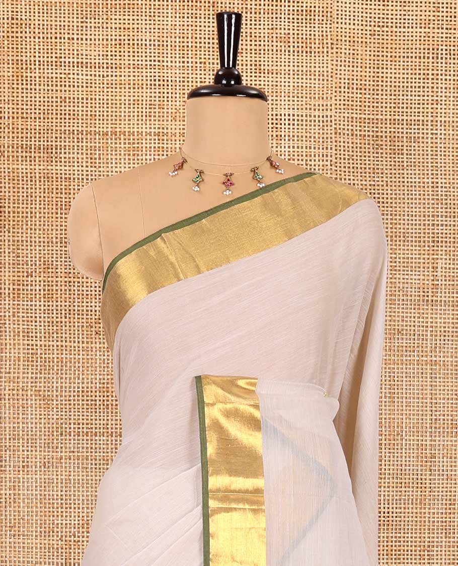 Cream plain khadi mul cotton saree, contrast gold zari bavanji border, self-pallu, and a plain blouse