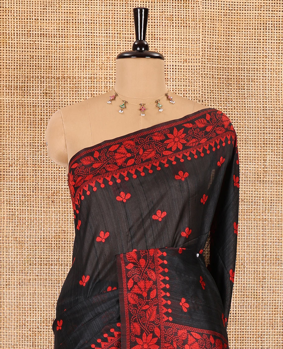 Black and red floral thread buttas woven jute cotton saree, floral thread weave border, floral-paisley weave pallu, and a matching blouse