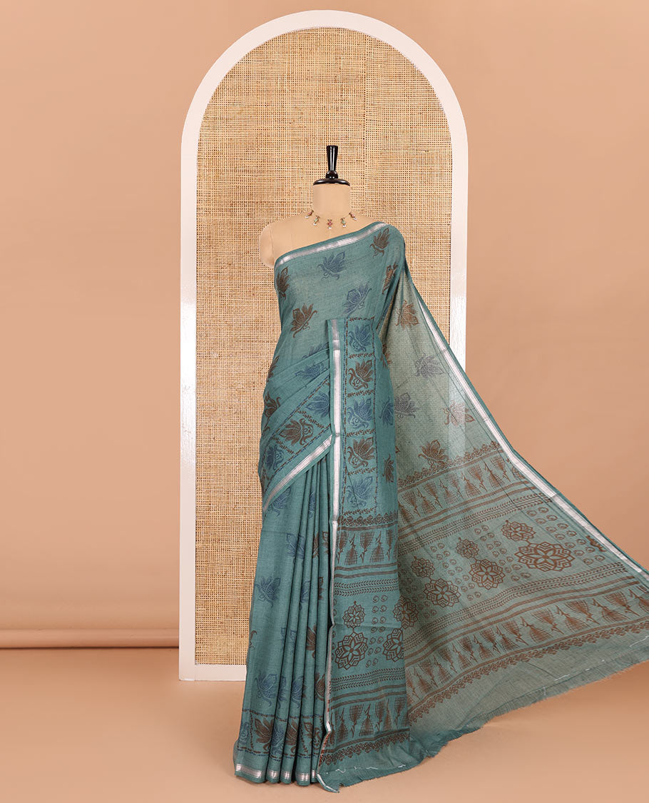 Green lotus printed soft cotton saree, piping border, printed pallu, and a shibori printed blouse of polka dots