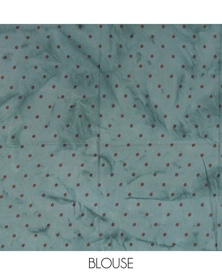 Green lotus printed soft cotton saree, piping border, printed pallu, and a shibori printed blouse of polka dots