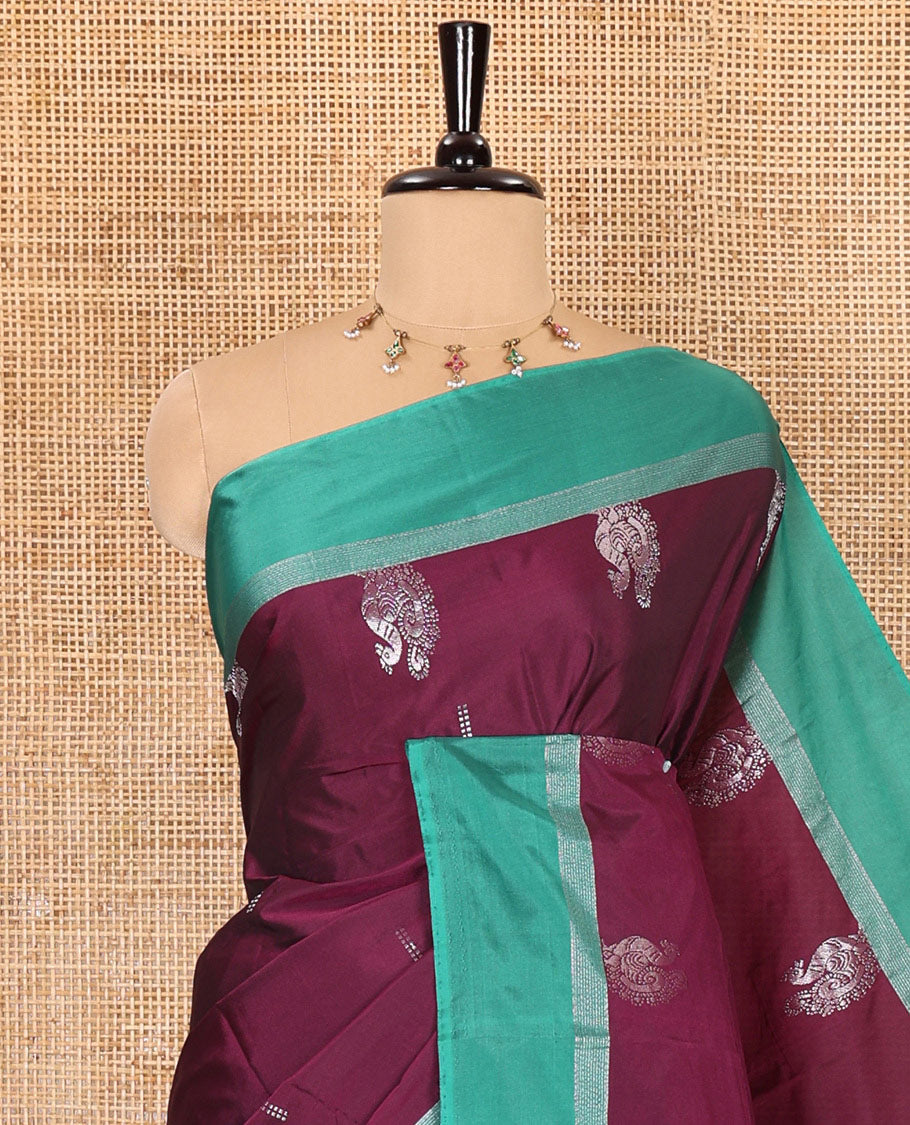 Purple zari buttas and peacock buttas semi-soft silk saree, contrast zari striped border, zari design pallu, and a matching blouse