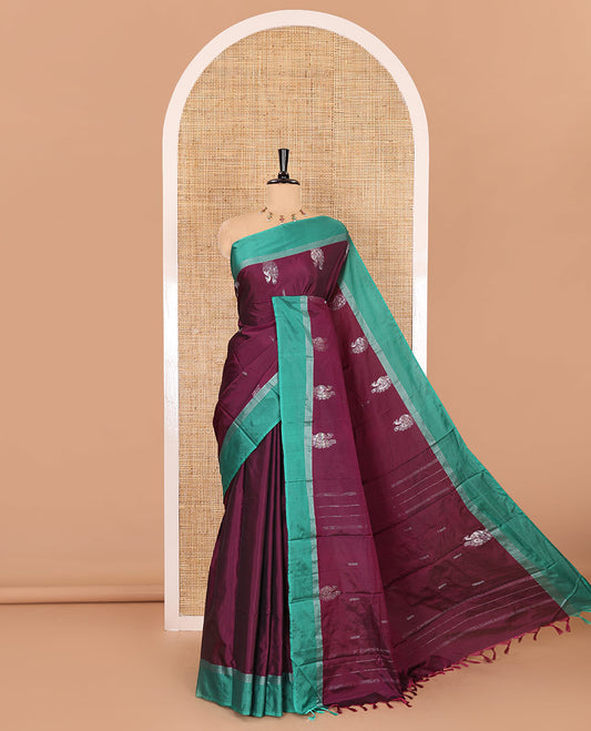 Purple zari buttas and peacock buttas semi-soft silk saree, contrast zari striped border, zari design pallu, and a matching blouse