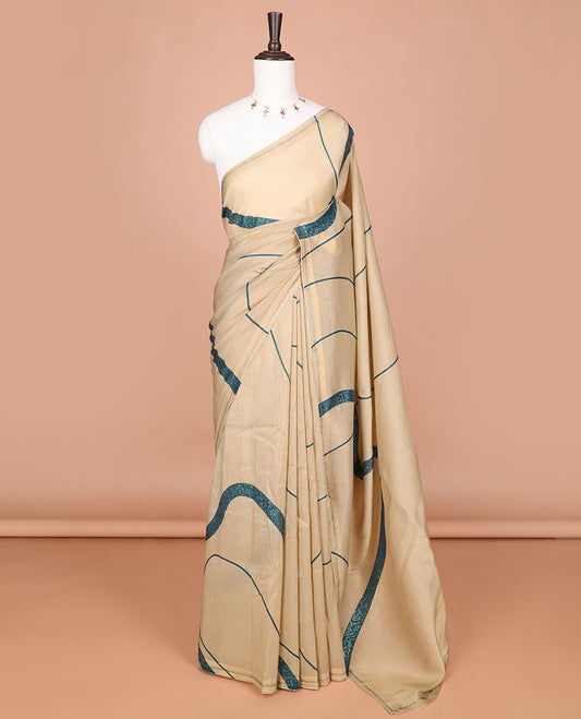 Cream with blue fancy print, swarovski stone work cruncy crush saree, swarovski stone work border & self pallu along with swarovski stone work blouse