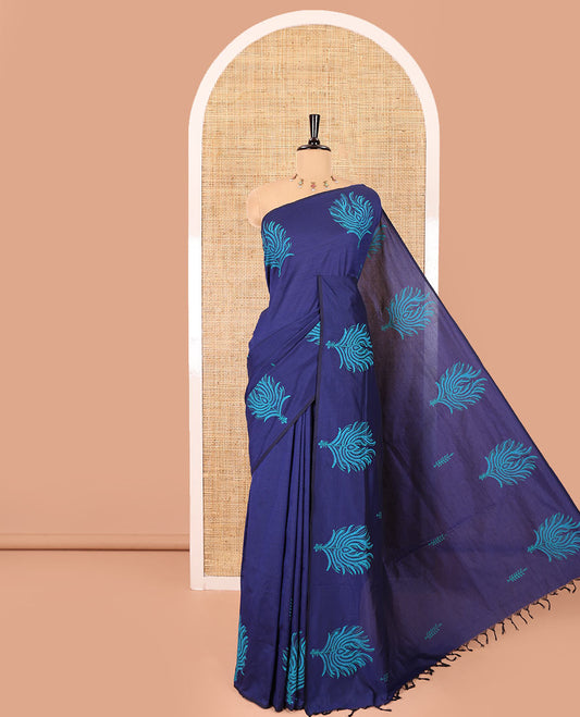 Blue leaf-motif block-printed South cotton saree, floral motif block-printed border, a printed pallu with a matching blouse, and a contrast printed blouse