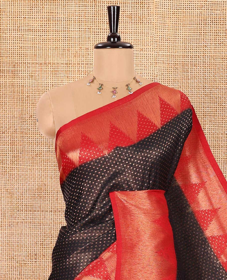 Black Luxury Soft Silk Saree Accentuated with 1000 Zari Buttas All Over Its Body, Complemented by a Contrast Temple Zari Border, Grandly Woven Pallu of Jaal Designs, and Paired with a Contrast Jacquard Blouse