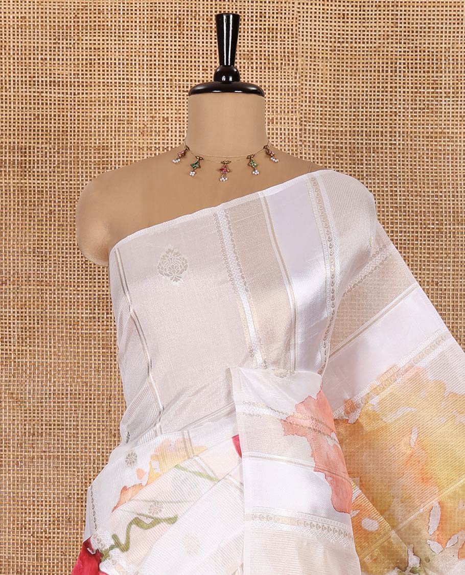 Borderless White-Base Semi-Dupion Saree Embellished with Abstract-Style Floral Prints and Zari Designs Woven All Over Its Body and Pallu, Paired with a Captivating Contrast Floral Buttas Yellow Blouse