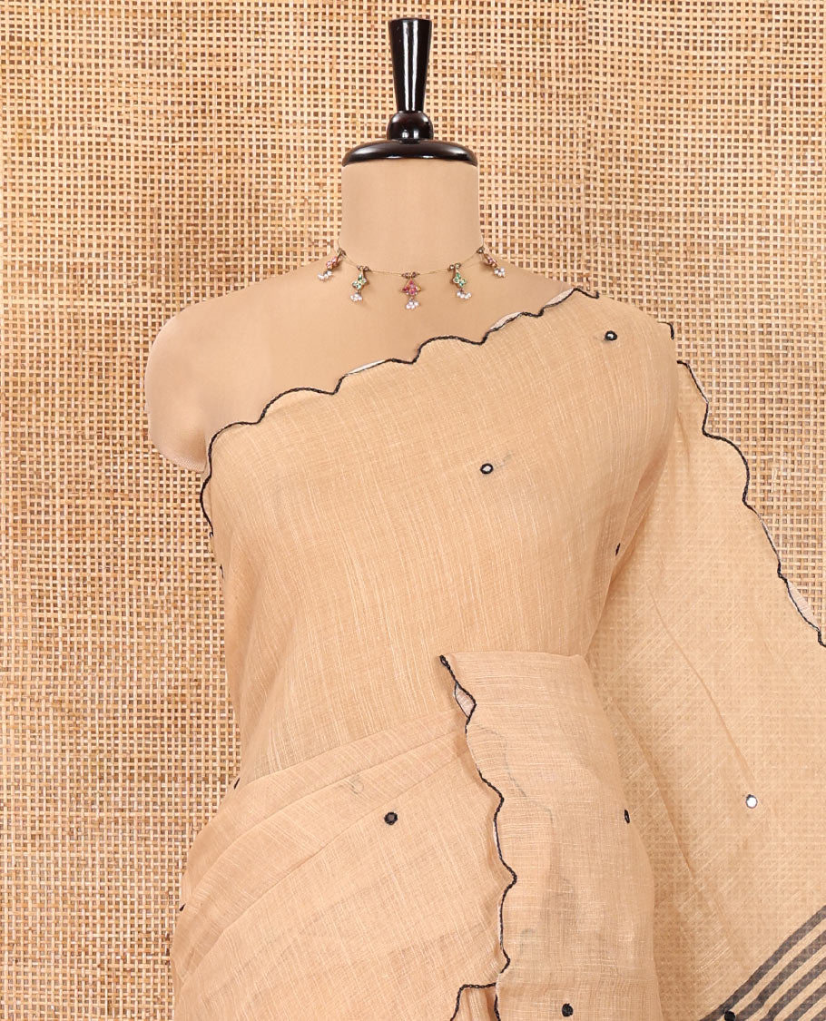 Chikku Linen Cotton Saree, Adorned with Mirror Work All Over Its Body, Subtly Scallop Border, Complemented by Contrast Pallu of Stripes and Mirror Work, and Paired with a Contrast Geometric Printed Blouse