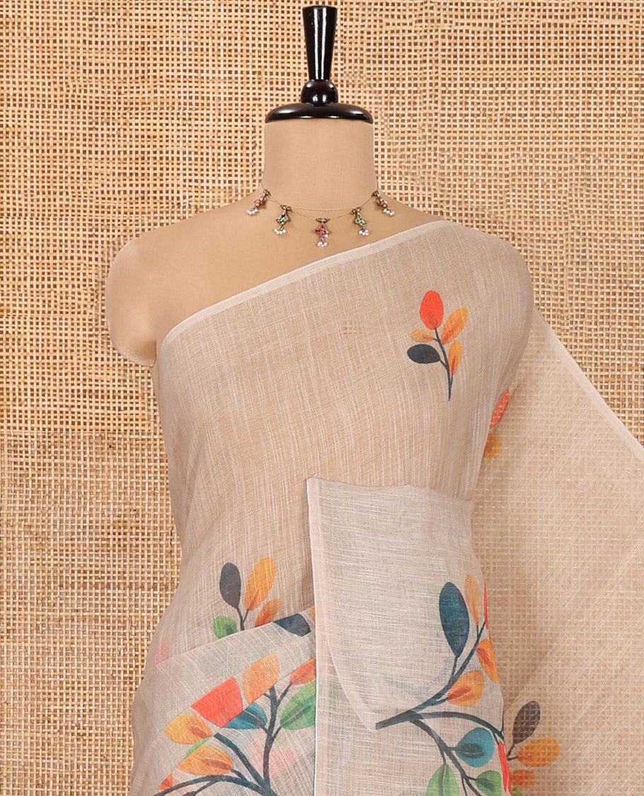 Borderless Chikku Linen Cotton Saree, Artfully Designed with Multi-color Leaf Motifs Print, Pallu Mirrors the Same Print, and Paired with a Matching Leaf Printed Blouse