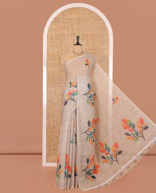 Borderless Chikku Linen Cotton Saree, Artfully Designed with Multi-color Leaf Motifs Print, Pallu Mirrors the Same Print, and Paired with a Matching Leaf Printed Blouse