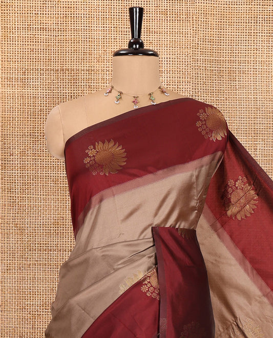 Chikku Kanchi Silk Saree, Adorned with Zari Buttas All Over Its Body, Complemented by a Contrast Border of Flower Motifs, Pallu Features Intricate Designs, and Paired with a Contrast Blouse