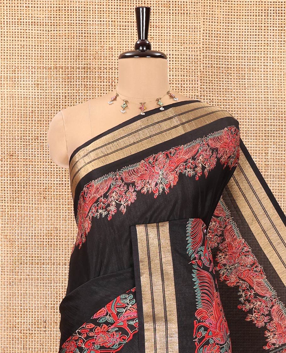 Black Dola Silk Saree, Features Colorful Floral and Peacock Motifs Printed On Its Body, Highlighted by Zari Border, Pallu Depicts Wedding-themed Motifs Print, and Paired with a Matching Blouse
