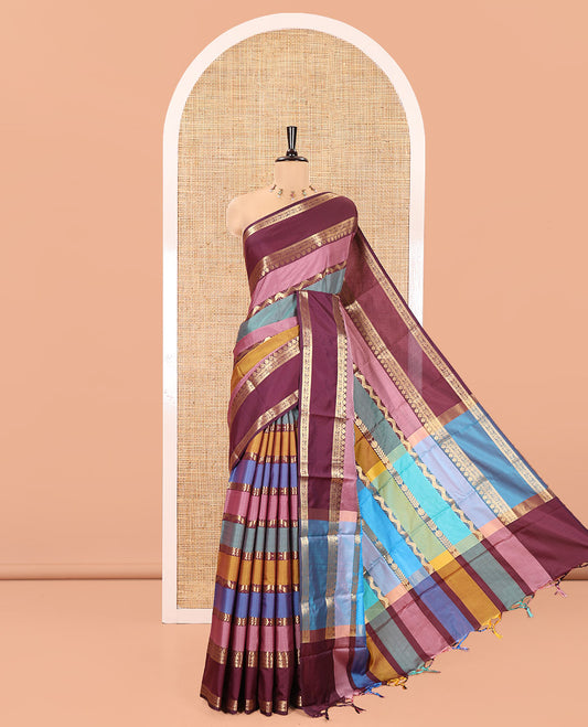 Multi Color Semi-Soft Silk Saree, Richly Detailed with Multi-color Stripes and Traditional Zari Designs On Its Body, Complemented by Contrast Rettai Pettu Traditional Zari Designs Woven Border, Grand Pallu and Paired with a Contrast Blouse