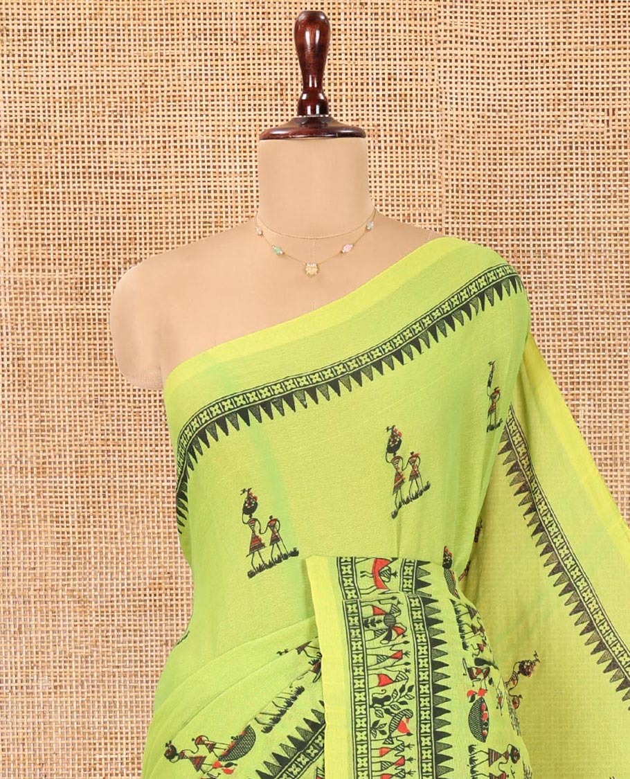 Green Khadi Mul Cotton Saree, Artfully Printed with Warli Motifs All Over Its Body, Highlighted by a Self-Border of Warli Print, Pallu of Warli Print, and Paired with a Matching Blouse