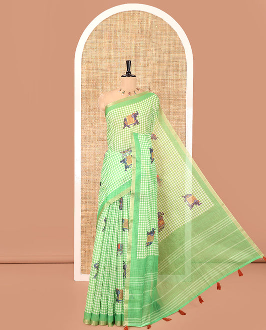 Green Linen Cotton Saree, Decked Up with Micro-Checks and Elephant Motifs on Its Body, Complemented by a Contrast Border, Striped Pallu, and Paired with a Contrast Elephant Motifs Printed Blouse