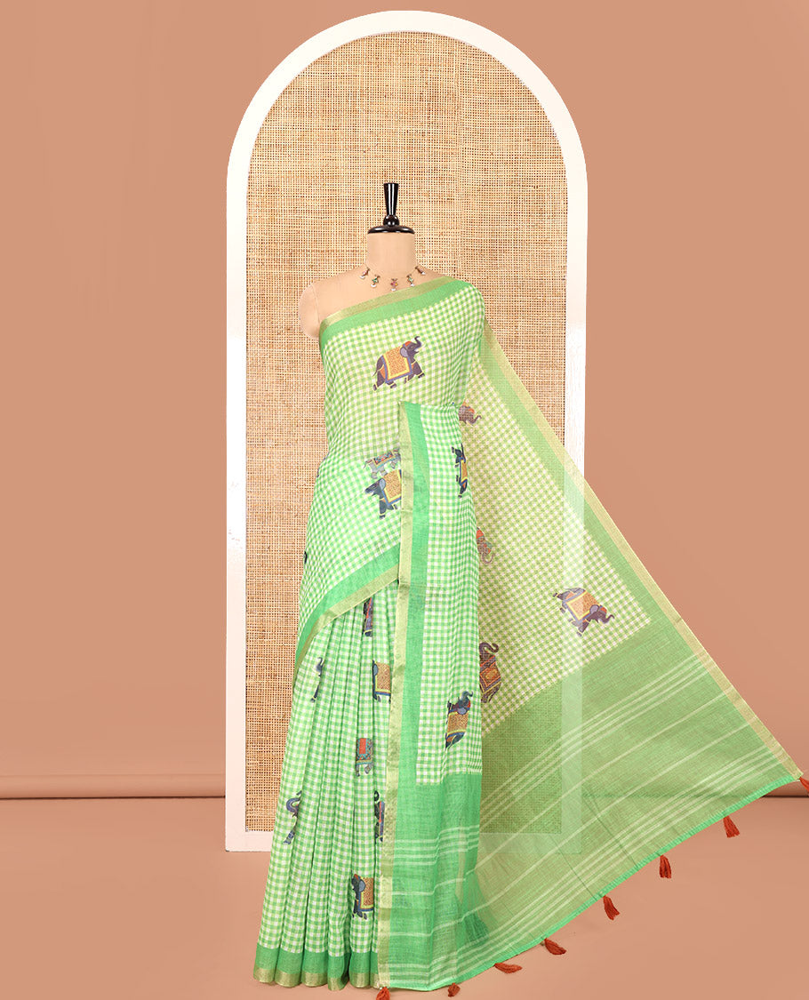 Green Linen Cotton Saree, Decked Up with Micro-Checks and Elephant Motifs on Its Body, Complemented by a Contrast Border, Striped Pallu, and Paired with a Contrast Elephant Motifs Printed Blouse