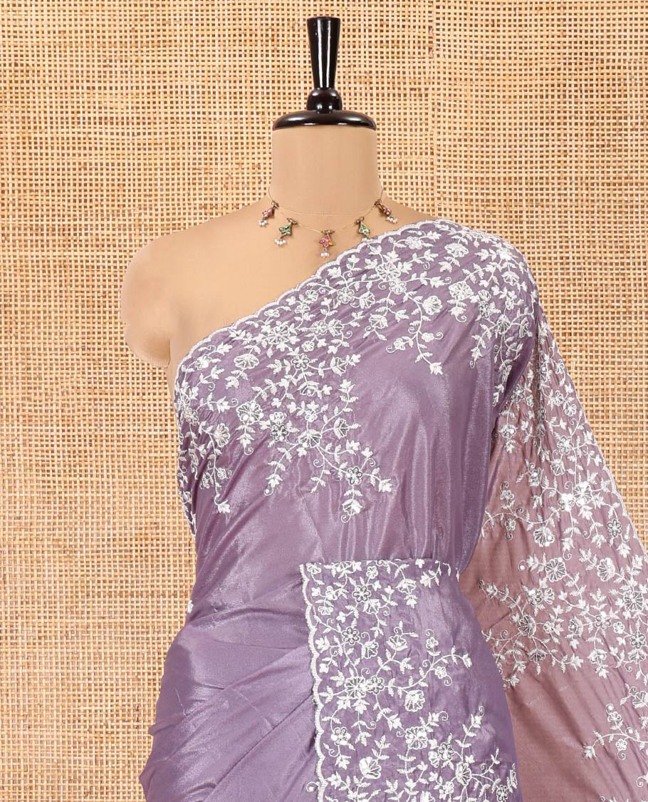 Lavender Plain Satin Crepe Saree, Accentuated with Floral Vine Thread Embroidery on Its Border, a Self-Pallu, and Paired with a Matching Blouse