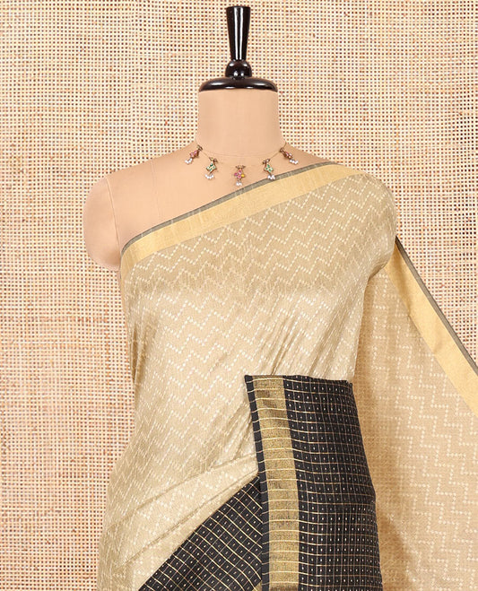 Chikku Semi-Raw Silk Saree, Delicately Woven with Zig-Zag Stripes All Over Its Body, Complemented by Contrast Border of Butta Enclosed Checks, Striped Pallu, and Paired with a Contrast Blouse