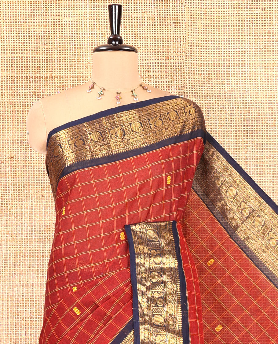 Maroon Chettinad Cotton Saree, Adorned with Buttas Enclosed Checks, Contrast Traditional Zari Border, and a Matching Blouse