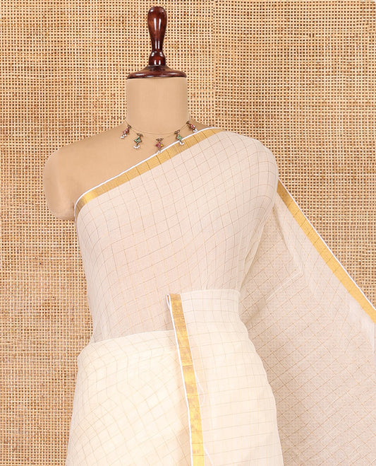 Cream Khadi Mul Cotton Saree, Subtly Sparkled With Zari Checks, a Zari Piping Border and No Blouse