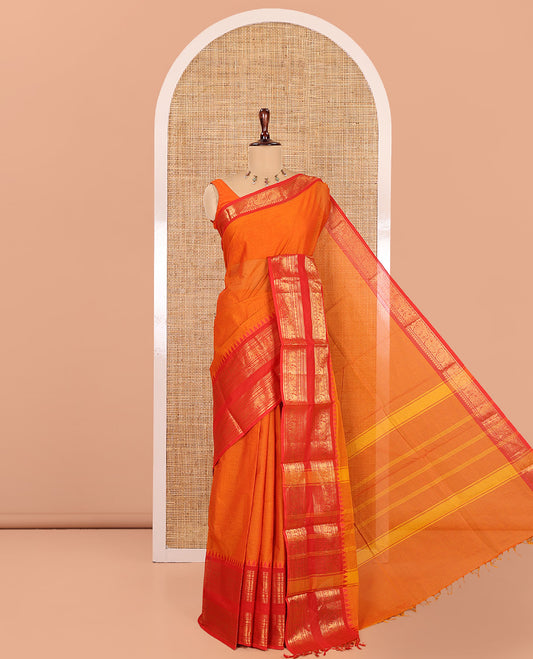Orange Chettinad Cotton Saree, a Contrast Traditional Rettai Pettu Temple Border, Striped Pallu, and Matching Blouse