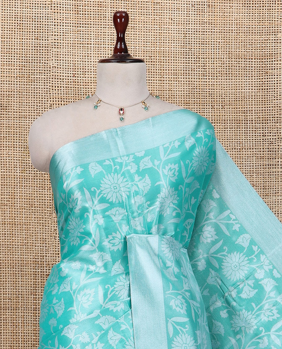 Rama Tissue Cotton Saree Features Floral Vine Design, a Zari Border, Contrast Intricate Pallu, and a Contrast Blouse