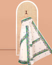 Cream Kerala Cotton Saree, Adorned with Floral Print, Contrast Floral Border, and a Contrast Floral Blouse