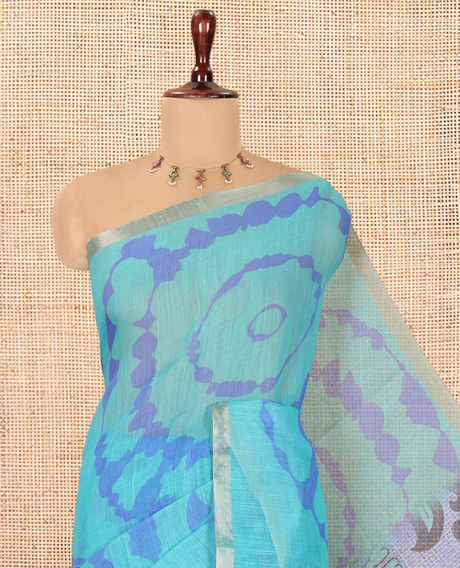 Rama Shibori Printed Linen Cotton Saree, a Piping Border, Floral Pallu, and a Contrast Blouse