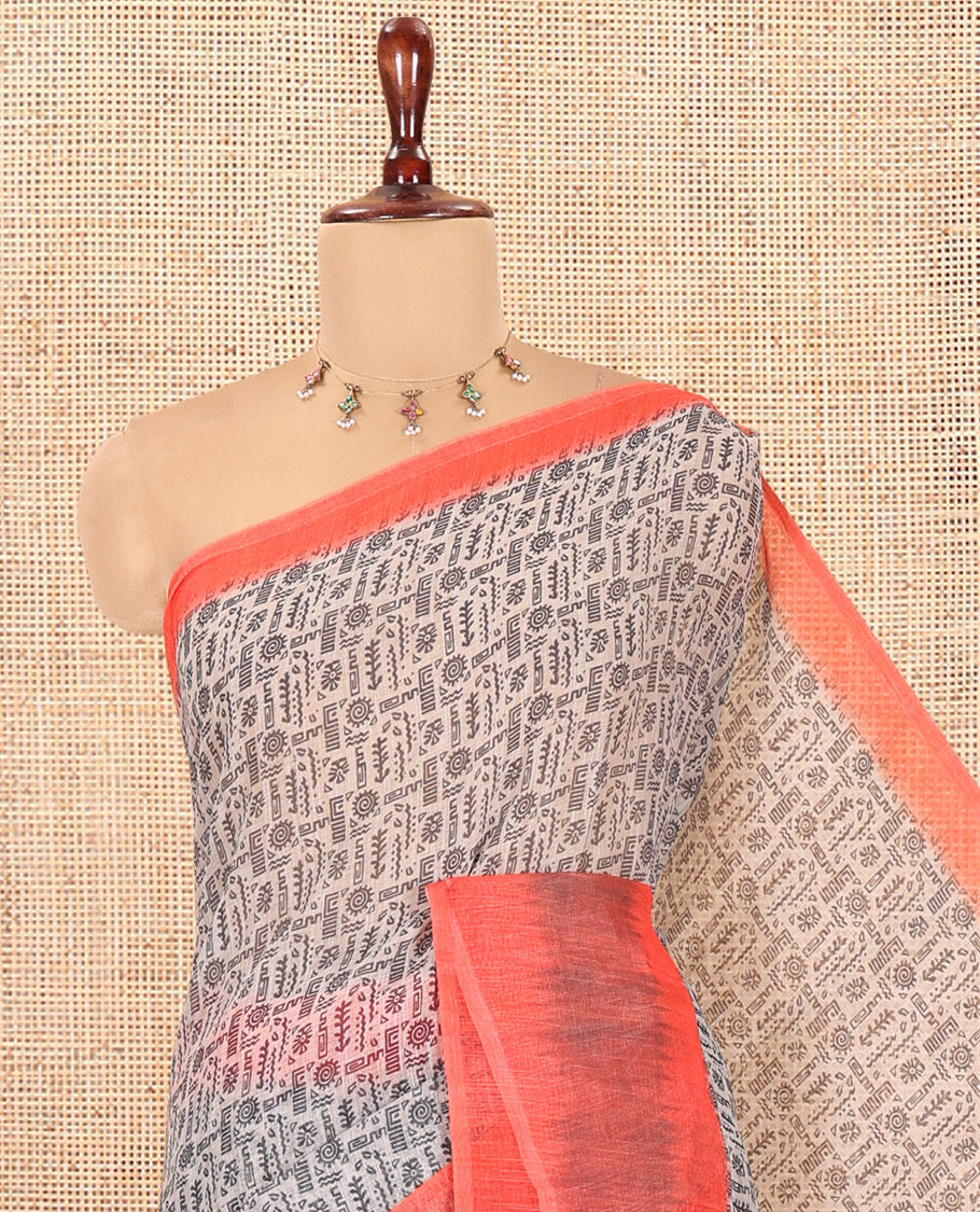Chikku-Orange Linen Cotton Saree, Ornamented with Intricate Print, a Contrast Ikat Border, Printed Pallu, and Contrast Blouse