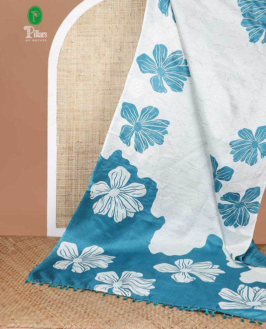 peacock blue floral design khadi silk saree with self border & solder pallu along with plain blouse