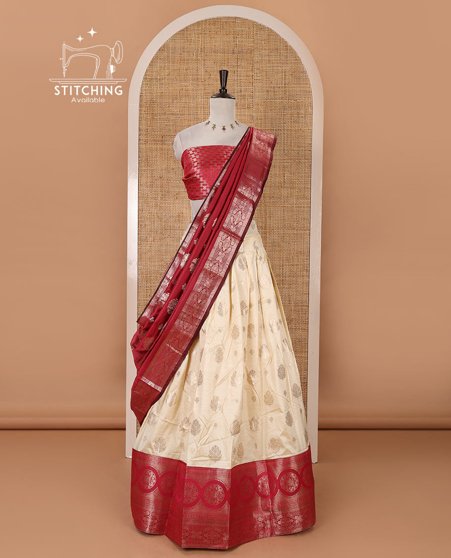 Cream-rani pink semi-banaras half-saree, zari buttas & contrast traditional zari border skirt, jacquard blouse & intricately zari woven dhavani
