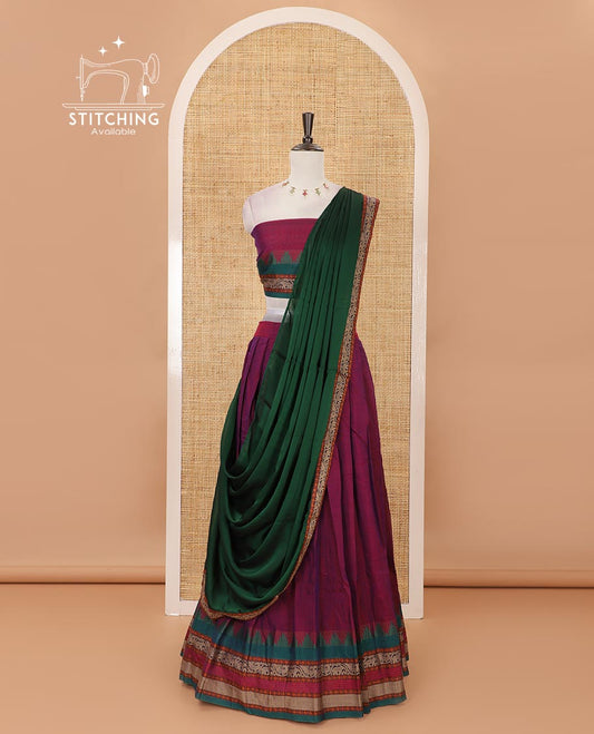 Magenta mercedised cotton half-saree, contrast traditional resham thread border skirt, matching blouse & contrast green thread border georgette dhavani