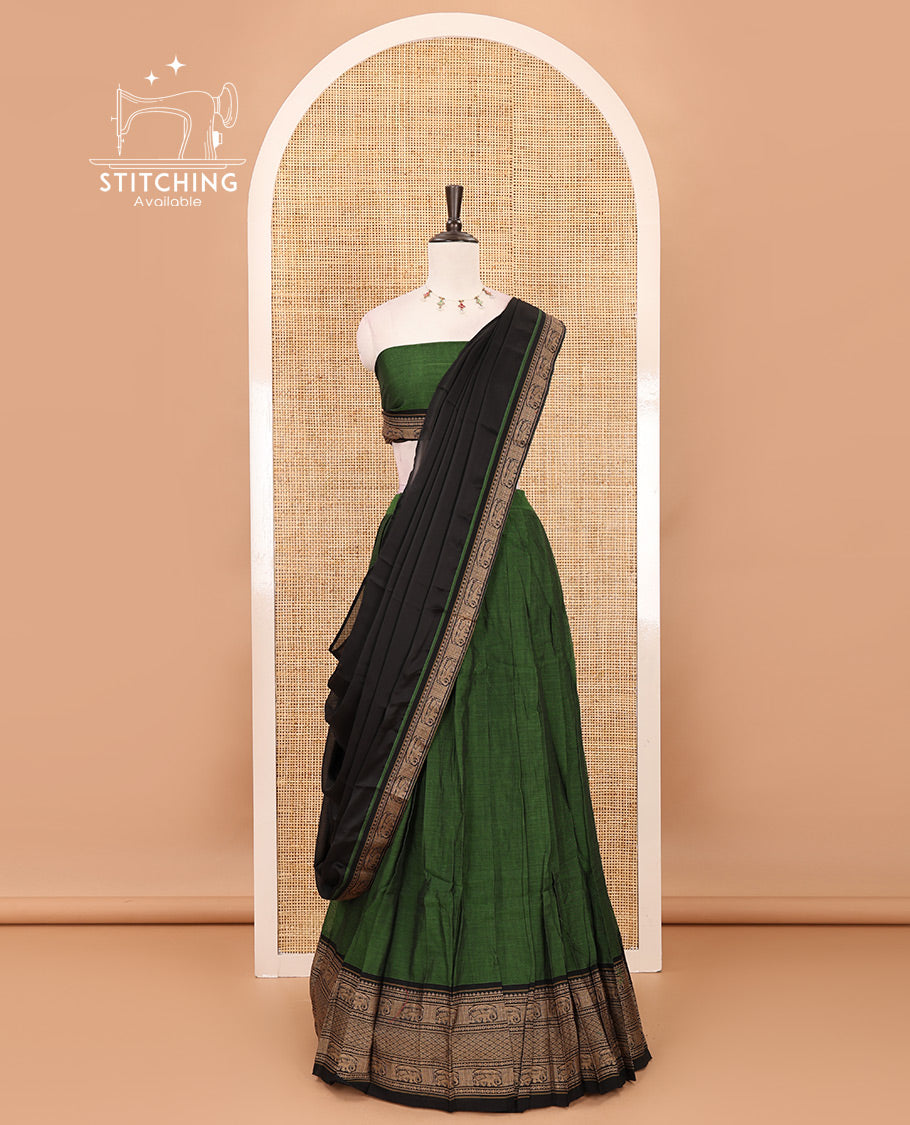Leaf green with black cotton half saree with contrast elephant design border,elephant design blouse & zari design border dhavani