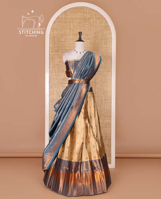 Gold banaras half saree, zari buttas with contrast blue traditional zari border skirt, matching blouse, dhavani of zari checks, and buttas