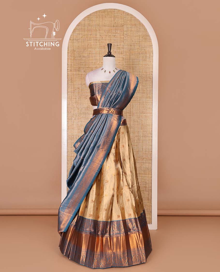 Gold banaras half saree, zari buttas with contrast blue traditional zari border skirt, matching blouse, dhavani of zari checks, and buttas