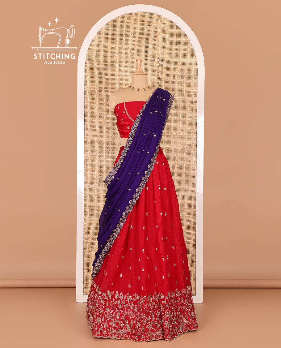 Red half-saree, floral and bird motifs embroidered velvet organza top, matching embroidered blouse, and contrast scallop embroidered syska georgette dhavani