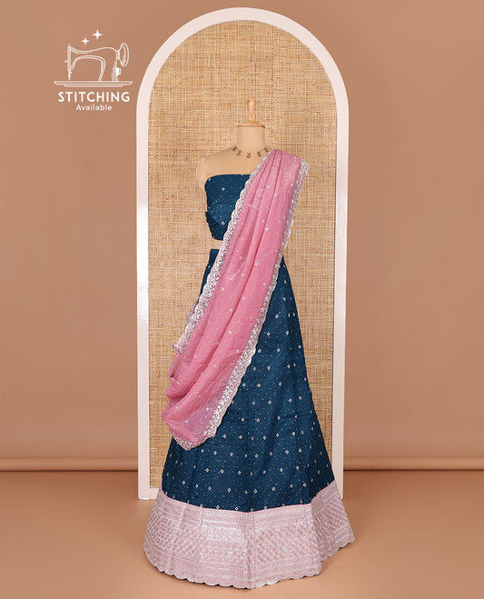 Blue half-saree, floral motifs embroidered semi-raw silk top, matching embroidered blouse, and contrast scallop embroidered georgette dhavani