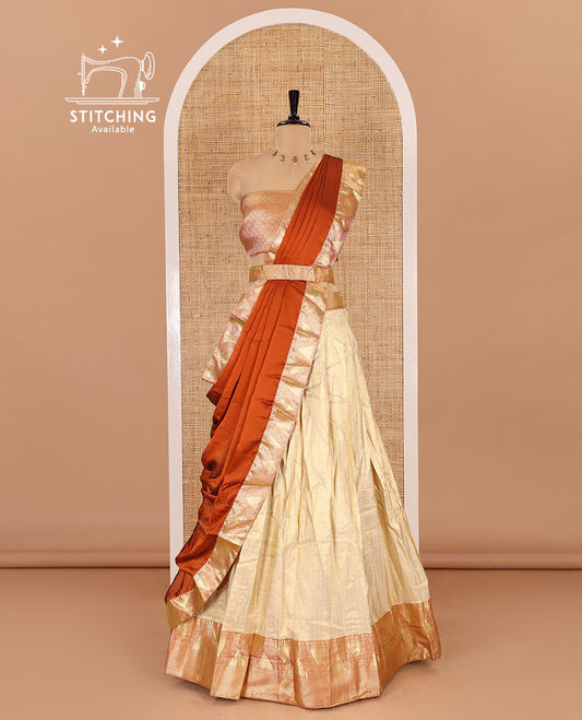 Chikku and rust half-saree, zari checked with contrast traditional zari bordered banarasi skirt, jacquard blouse, and a contrast zari bordered syska georgette dhavani