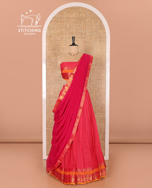 Rani Pink and Yellow Chettinad Cotton Half-Saree Featuring Checked Skirt, Highlighted with a Contrast Rettai Pettu Zari Peacock and Rudraksham Motifs Border, a Subtly Woven Matching Blouse, and a Georgette Traditional Zari-Bordered Dhavani