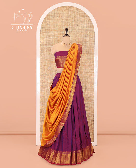 Magenta Mercerised Cotton Half-Saree Features Plain with Contrast Traditional Zari Temple Bordered Skirt, Paired with a Matching Blouse, and Comes with a Contrast Zari-Bordered Dhavani
