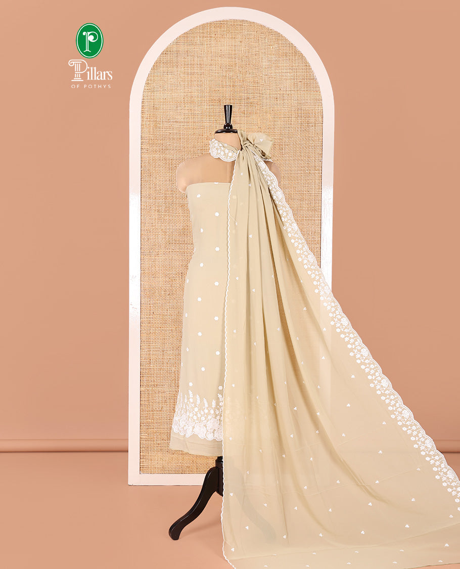 Green Fox Georgette Material Chudidar Set, Majestically Detailed with Floral Embroidery on Its Top, a Plain Santoon Bottom, and Paired with a Floral Embroidered Scallop Dupatta